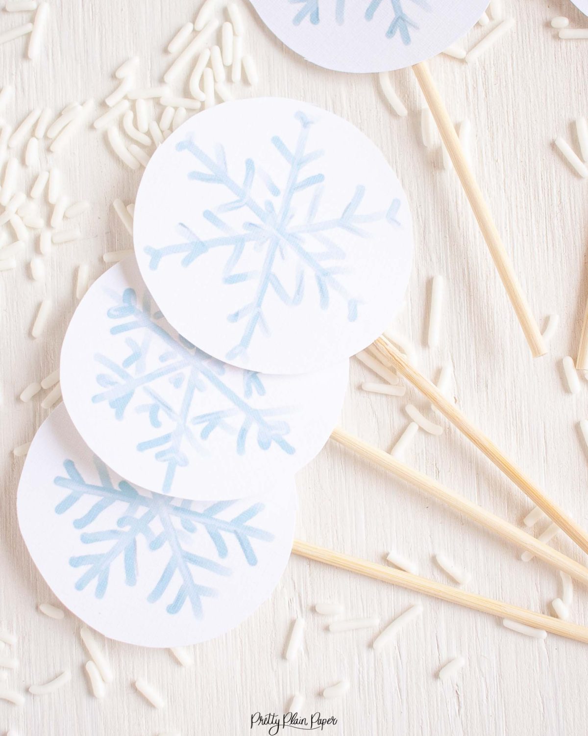 Snowflake Cupcake Topper Printables by Pretty Plain Paper