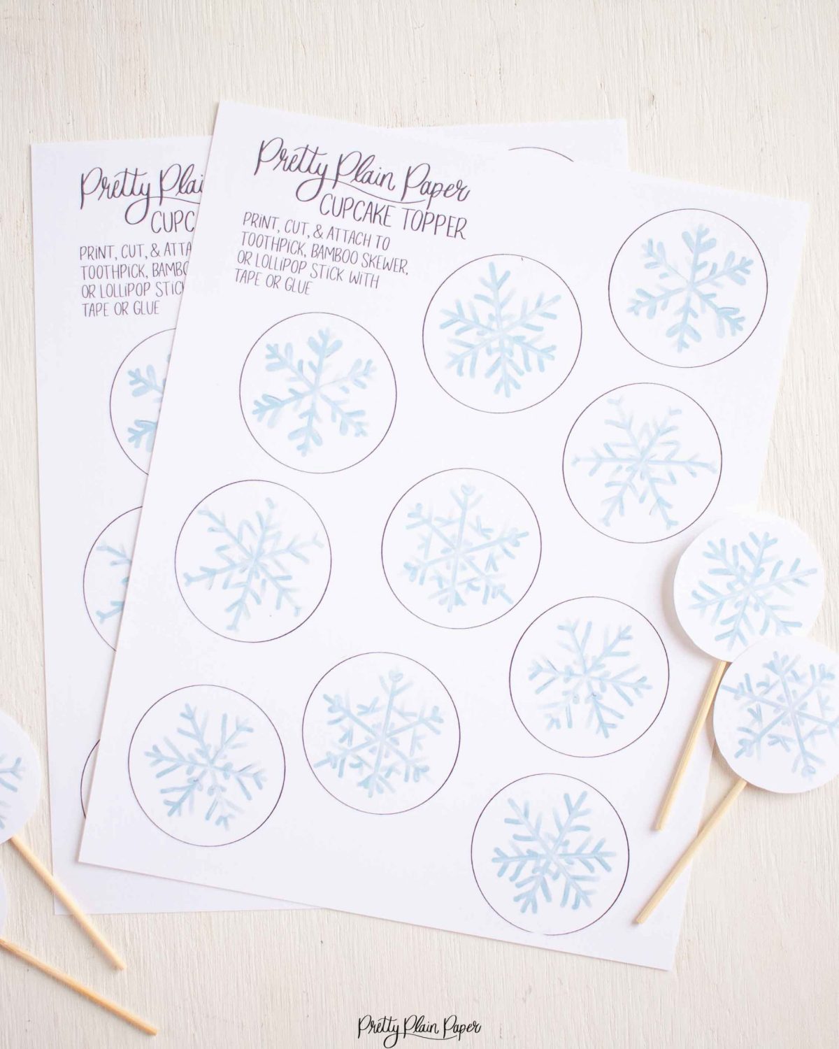Snowflake Cupcake Topper Printables by Pretty Plain Paper