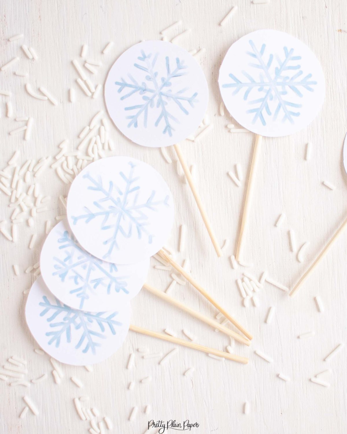 Snowflake Cupcake Topper Printables by Pretty Plain Paper