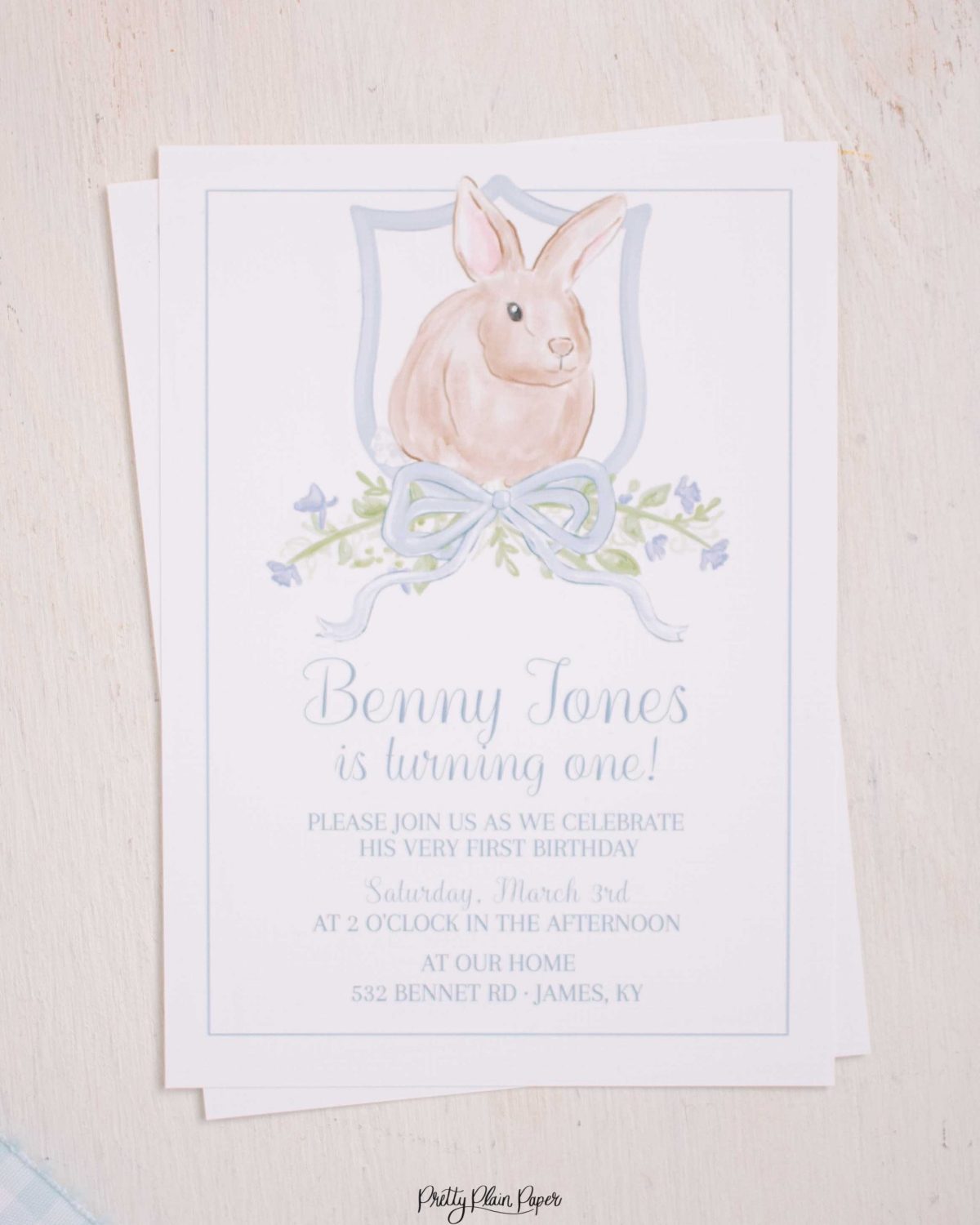 Watercolor Blue Bunny Invitation by Pretty Plain Paper for a Some Bunny is One Birthday Party or a Bunny Birthday Theme