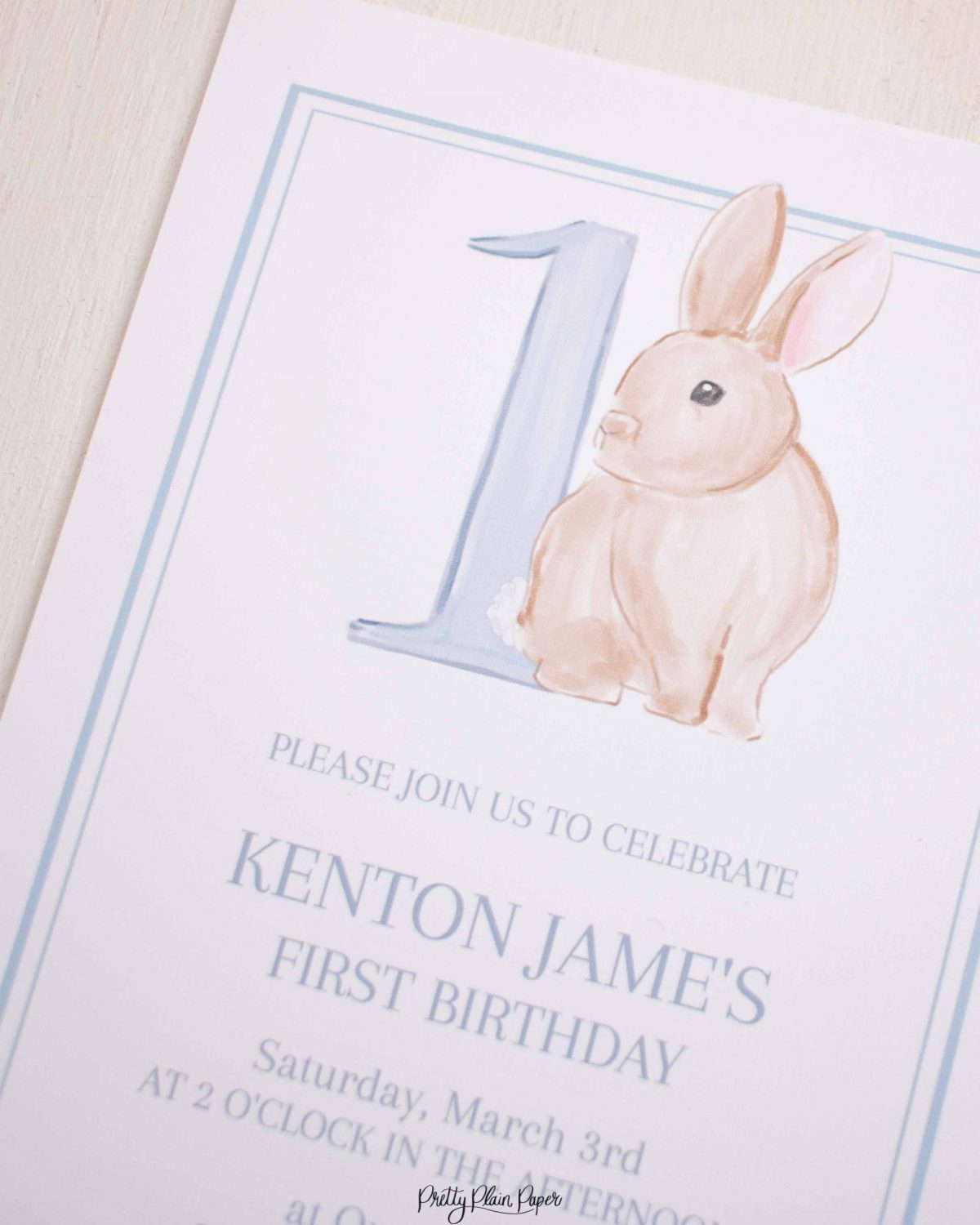 Watercolor Blue Bunny Invitation by Pretty Plain Paper for a Some Bunny is One Birthday Party or a Bunny Birthday Theme
