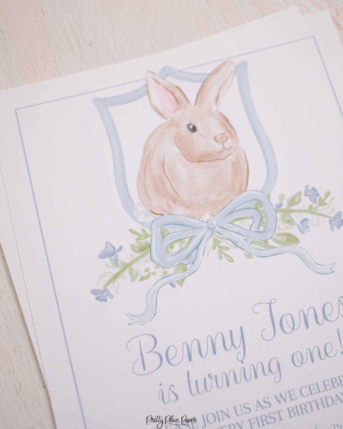 Watercolor Blue Bunny Invitation by Pretty Plain Paper for a Some Bunny is One Birthday Party or a Bunny Birthday Theme