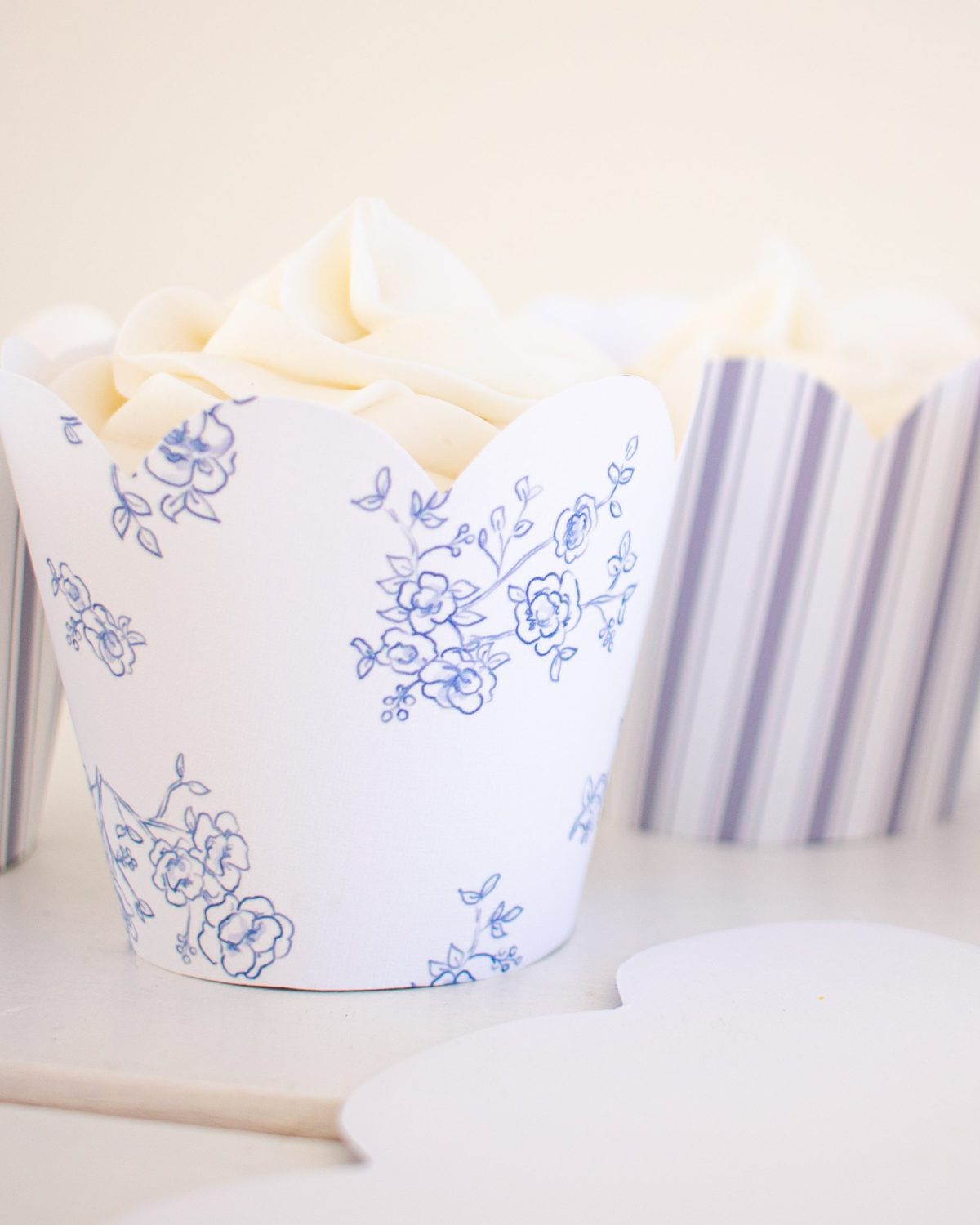 Watercolor Pancakes & Pajamas Birthday Party Blue Floral Cupcake Wrappers & Blue Stripe Cupcake Wrappers by Pretty Plain Paper for a Pancakes and Pajamas Party
