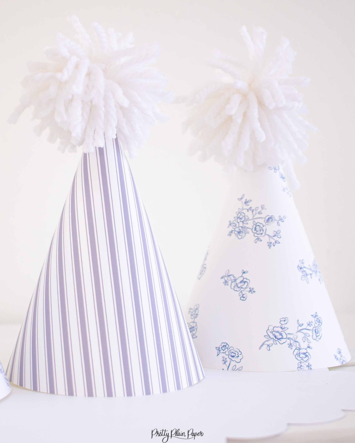 Watercolor Pancakes & Pajamas Birthday Party Blue Floral Party Hats & Blue Stripe Party Hats by Pretty Plain Paper for a Pancakes and Pajamas Party