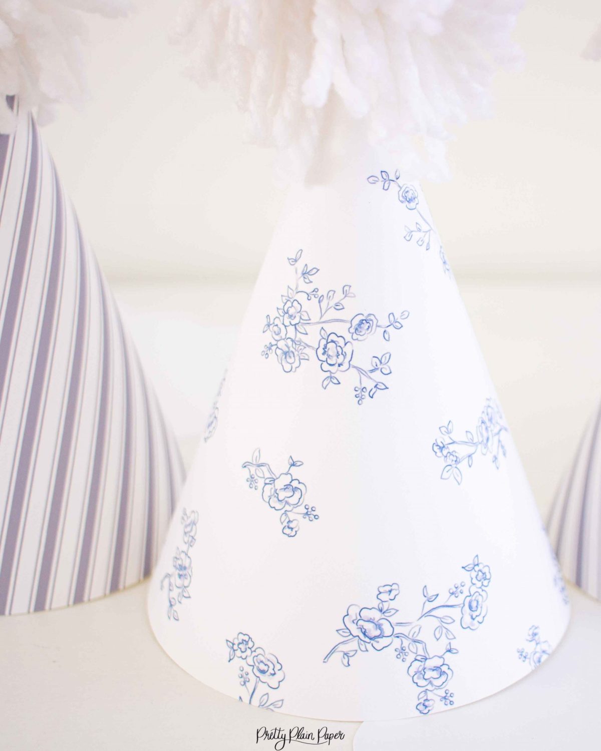 Watercolor Pancakes & Pajamas Birthday Party Blue Floral Party Hats & Blue Stripe Party Hats by Pretty Plain Paper for a Pancakes and Pajamas Party
