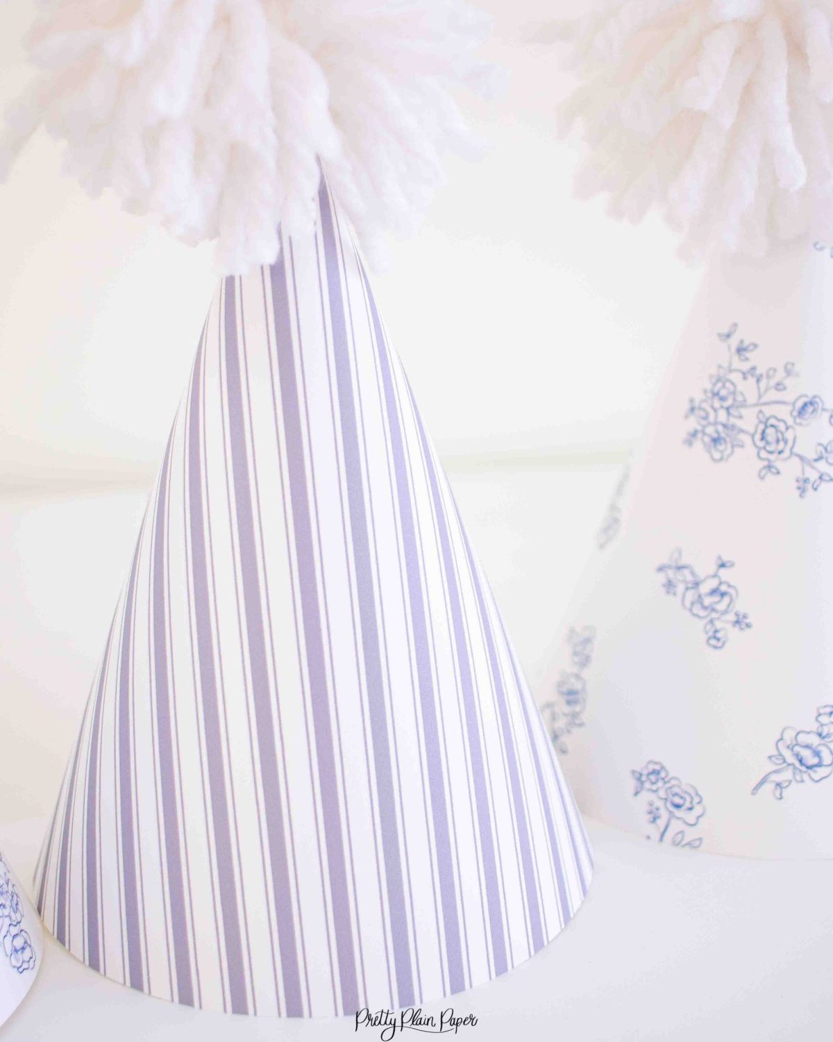 Watercolor Pancakes & Pajamas Birthday Party Blue Floral Party Hats & Blue Stripe Party Hats by Pretty Plain Paper for a Pancakes and Pajamas Party