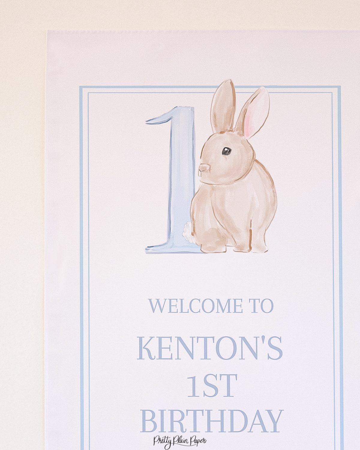 Watercolor Blue Bunny Birthday Party Welcome Sign by Pretty Plain Paper for a Some Bunny is One Birthday Party or a Bunny Birthday Theme