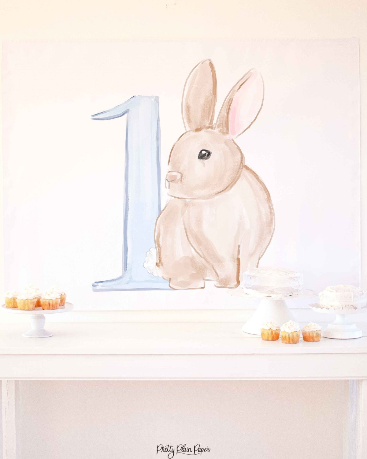 Watercolor Blue Bunny Birthday Party Backdrop by Pretty Plain Paper for a Some Bunny is One Birthday Party or a Bunny Birthday Theme