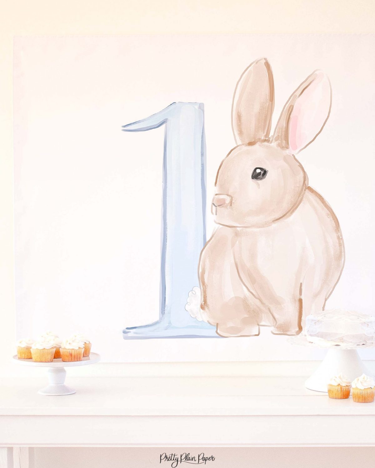 Watercolor Blue Bunny Birthday Party Backdrop by Pretty Plain Paper for a Some Bunny is One Birthday Party or a Bunny Birthday Theme