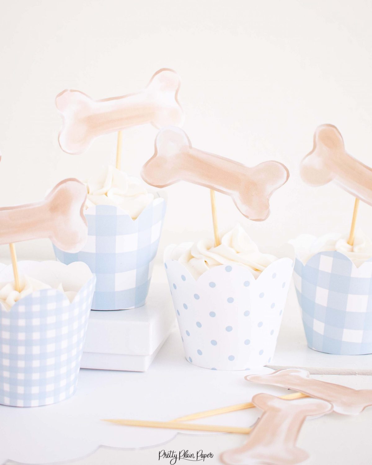 Puppy Dog Bone Cupcake Toppers for a Snips and Snails and Puppy Dog Tails Birthday by Pretty Plain Paper