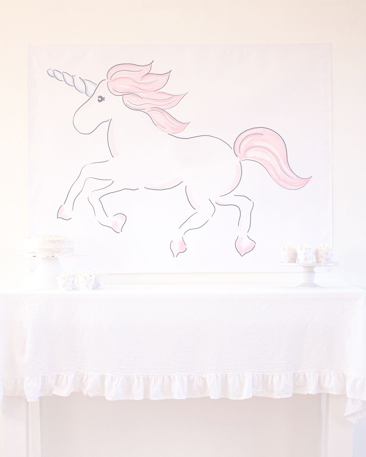 Watercolor Pink Unicorn Party Backdrop by Pretty Plain Paper for a Pink Unicorn Birthday or a Pink Unicorn Baby Shower