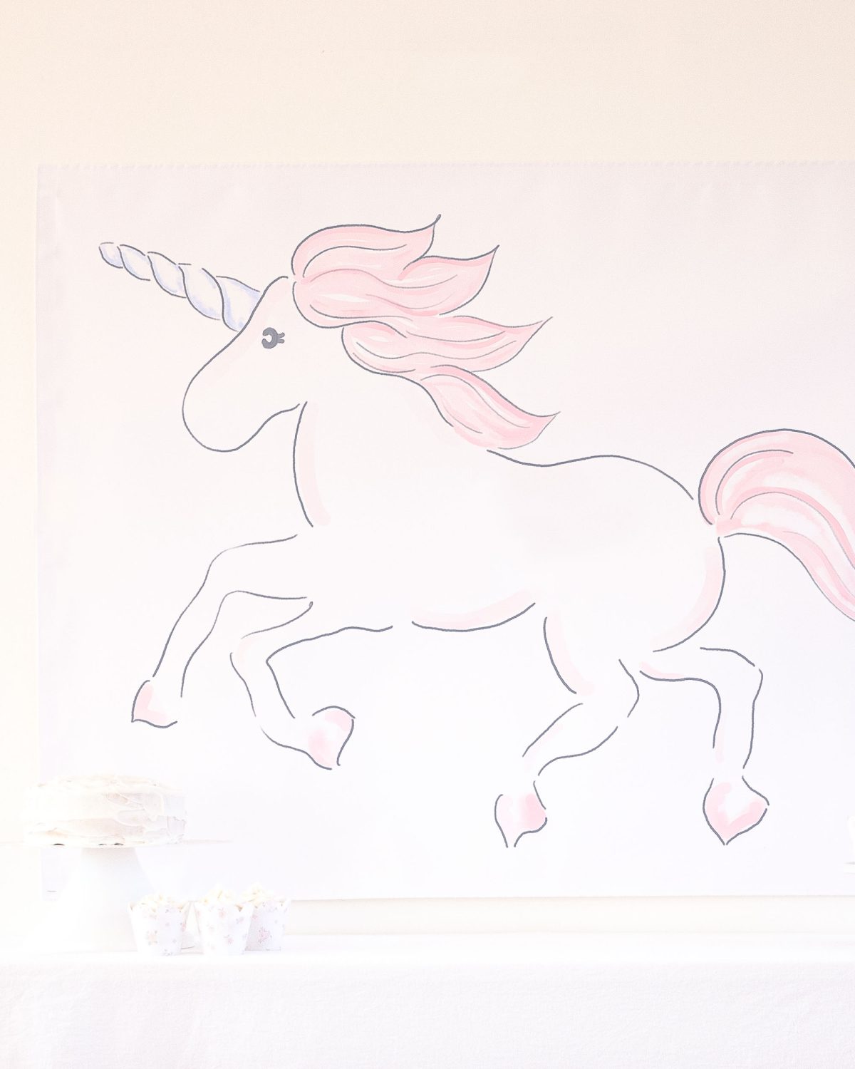 Watercolor Pink Unicorn Party Backdrop by Pretty Plain Paper for a Pink Unicorn Birthday or a Pink Unicorn Baby Shower