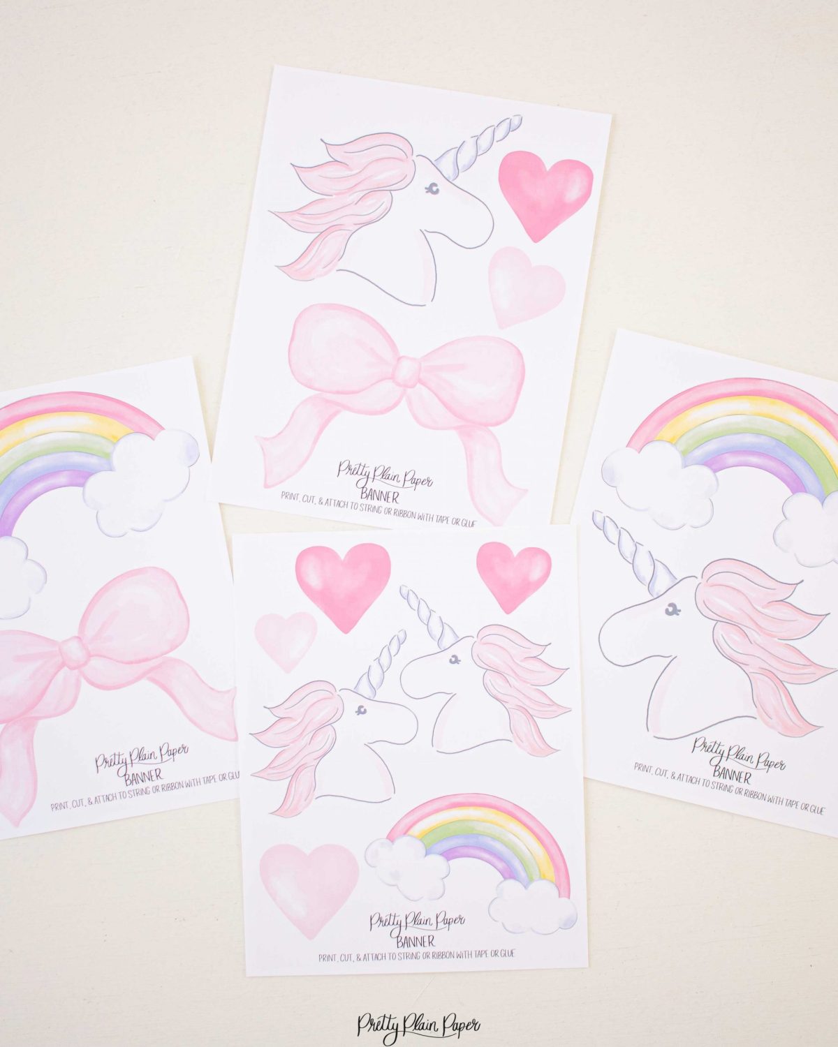 Watercolor Unicorns, Rainbows and Bows Birthday Party Banner by Pretty Plain Paper