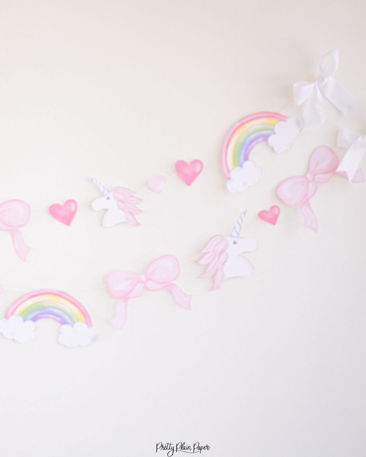 Watercolor Unicorns, Rainbows and Bows Birthday Party Banner by Pretty Plain Paper