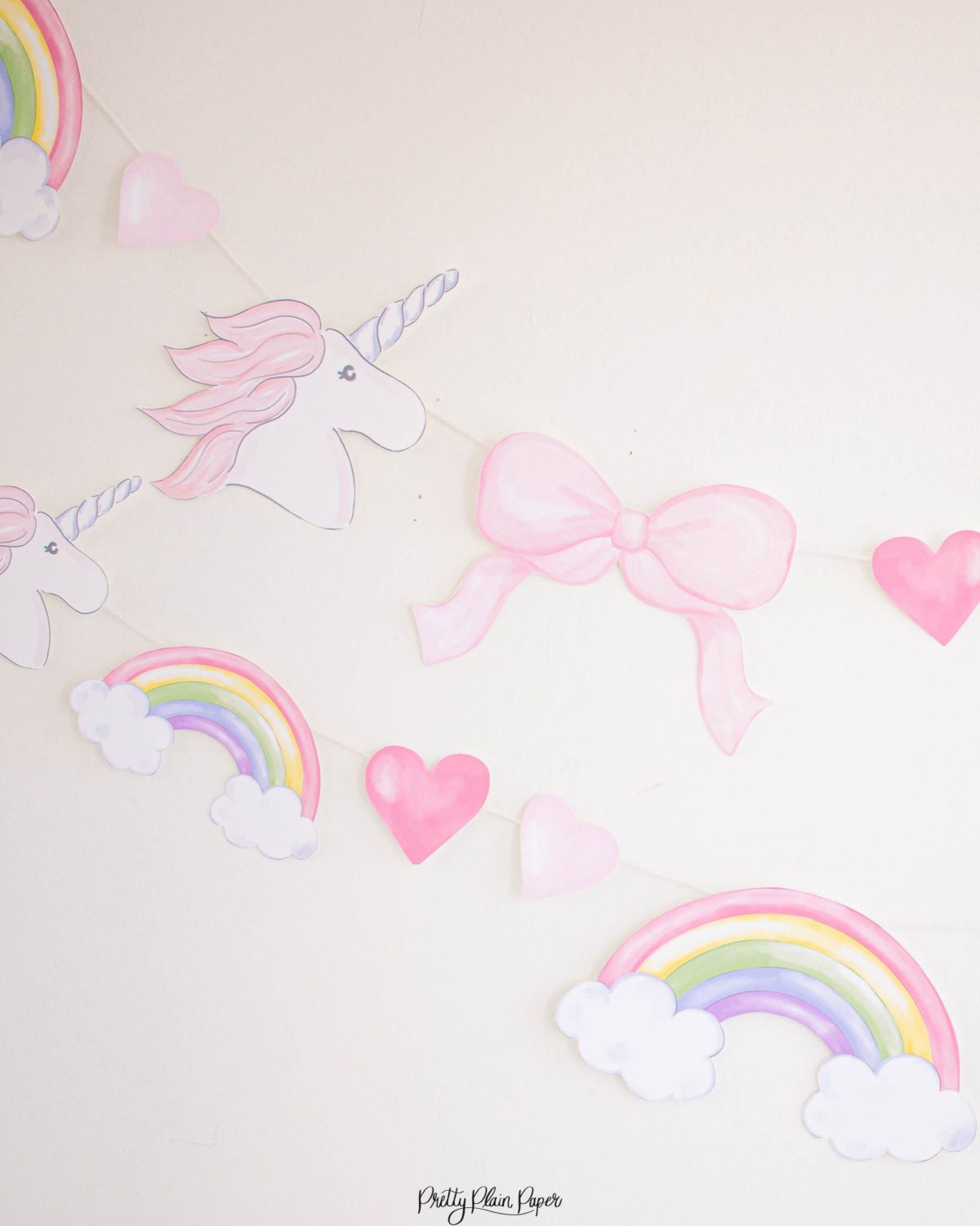 Watercolor Unicorns, Rainbows and Bows Birthday Party Banner by Pretty Plain Paper