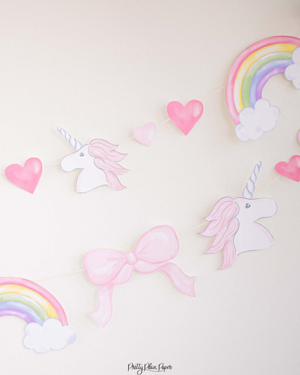 Watercolor Unicorns, Rainbows and Bows Birthday Party Banner by Pretty Plain Paper