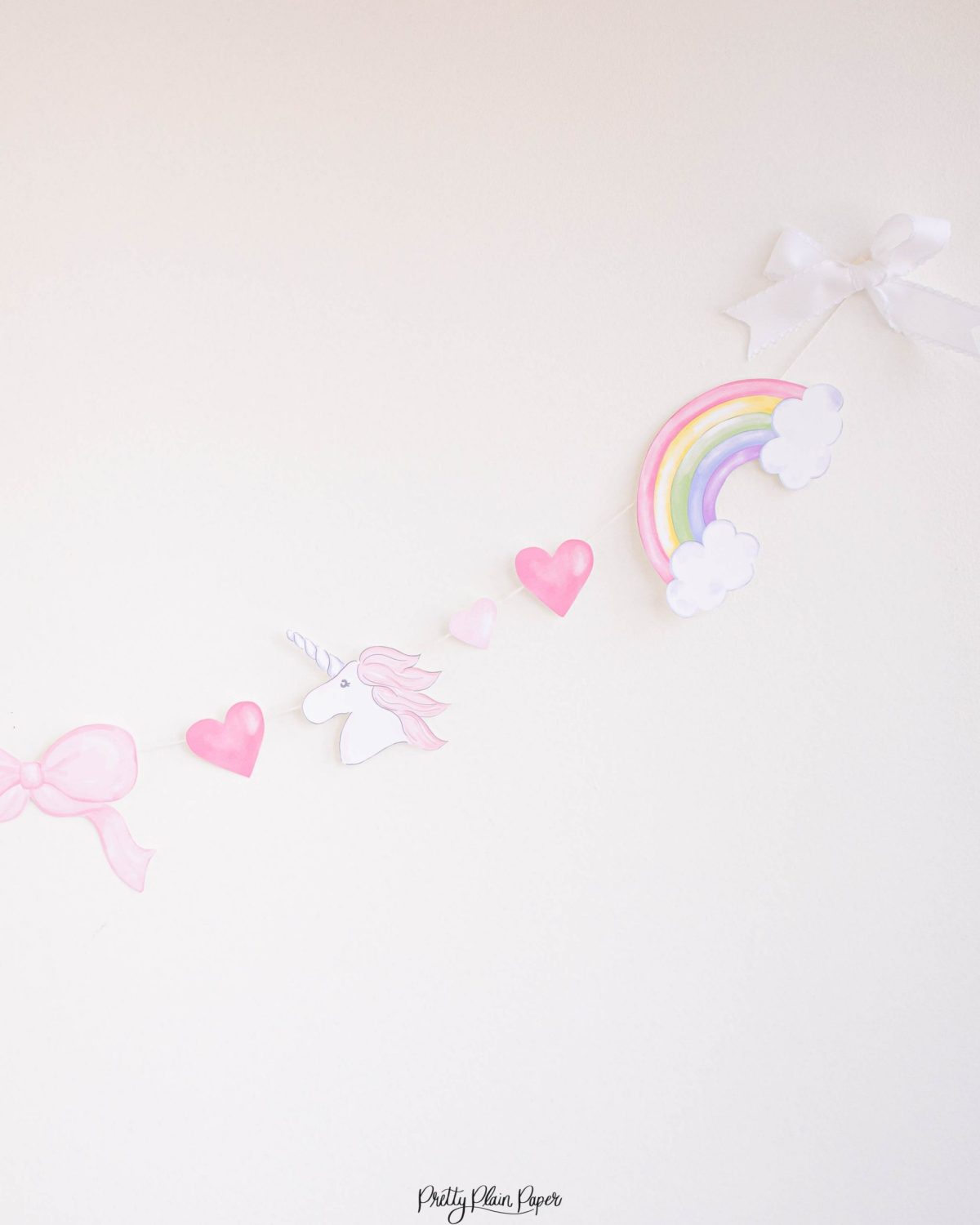 Watercolor Unicorns, Rainbows and Bows Birthday Party Banner by Pretty Plain Paper