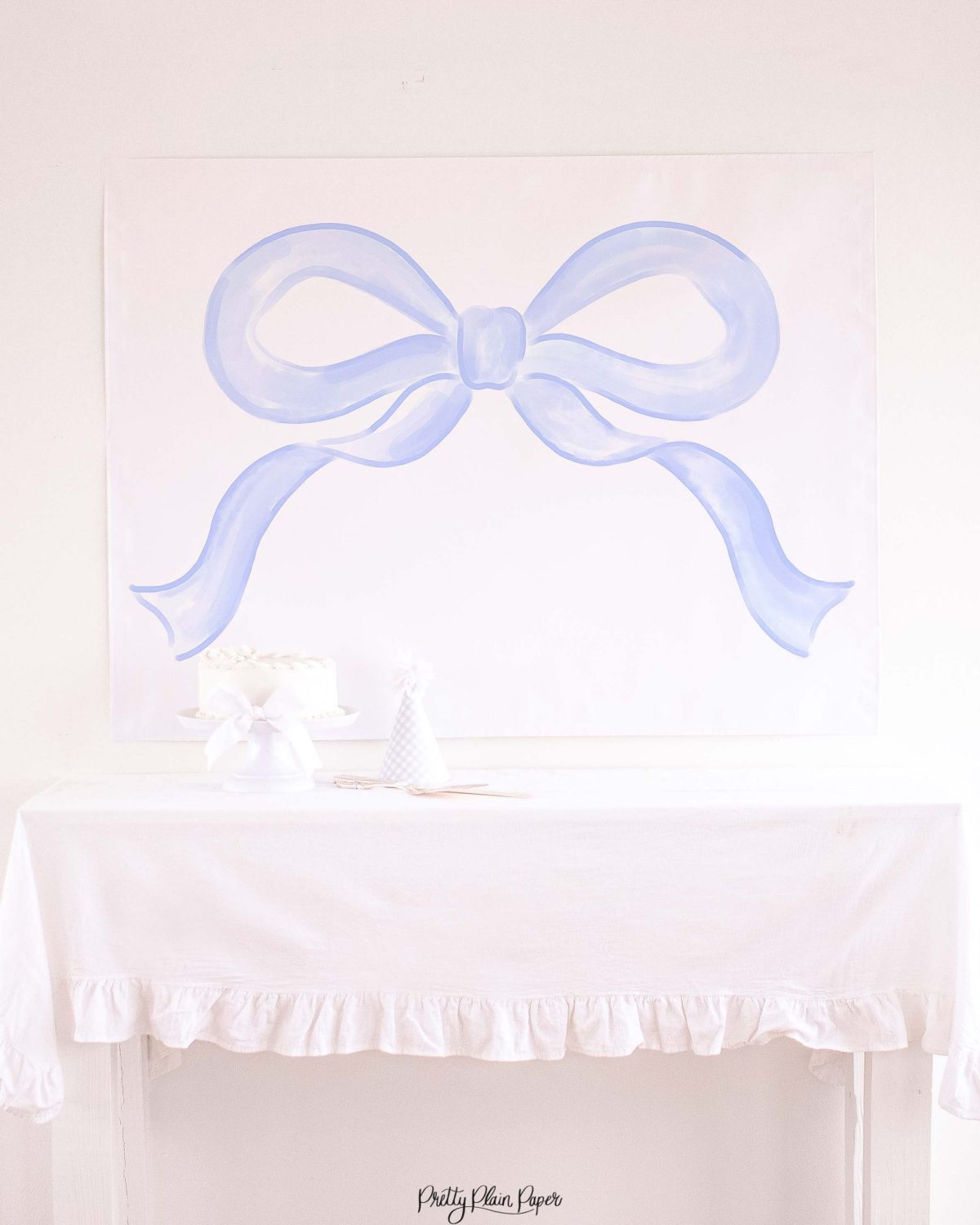 Watercolor Blue Bow Backdrop for a Blue Bow Birthday Party, Baby Shower, or Bridal Shower by Pretty Plain Paper