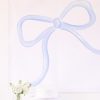 Watercolor Blue Bow Backdrop for a Blue Bow Birthday Party, Baby Shower, or Bridal Shower by Pretty Plain Paper