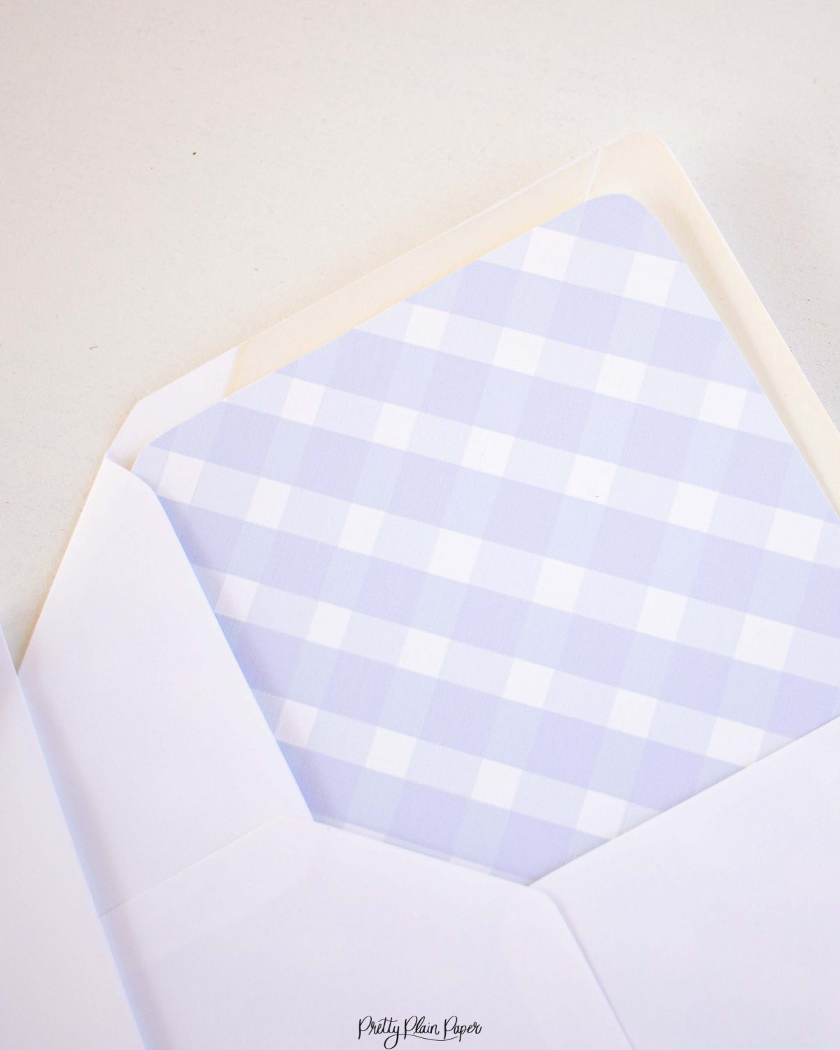 Watercolor Blue Gingham Envelope Liner by Pretty Plain Paper for a Simple, Classic, Traditional First Birthday Party for a Boy