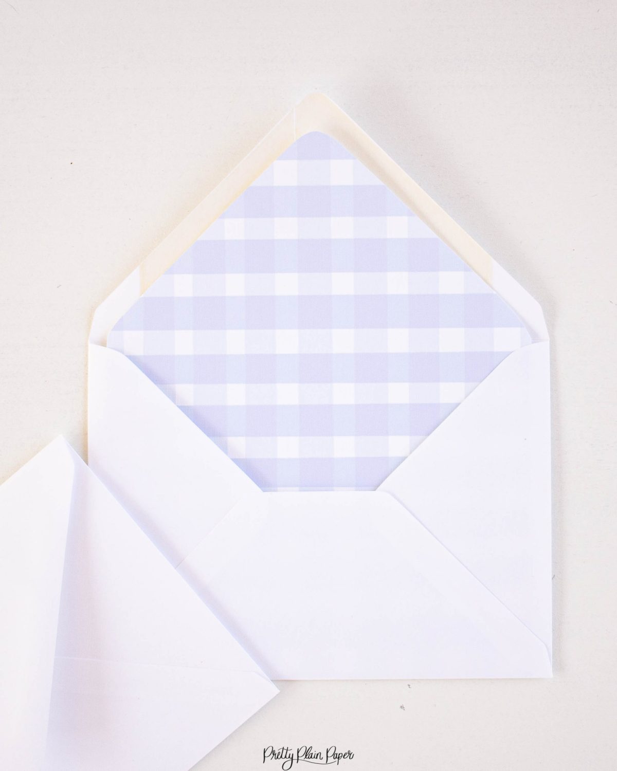 Watercolor Blue Gingham Envelope Liner by Pretty Plain Paper for a Simple, Classic, Traditional First Birthday Party for a Boy