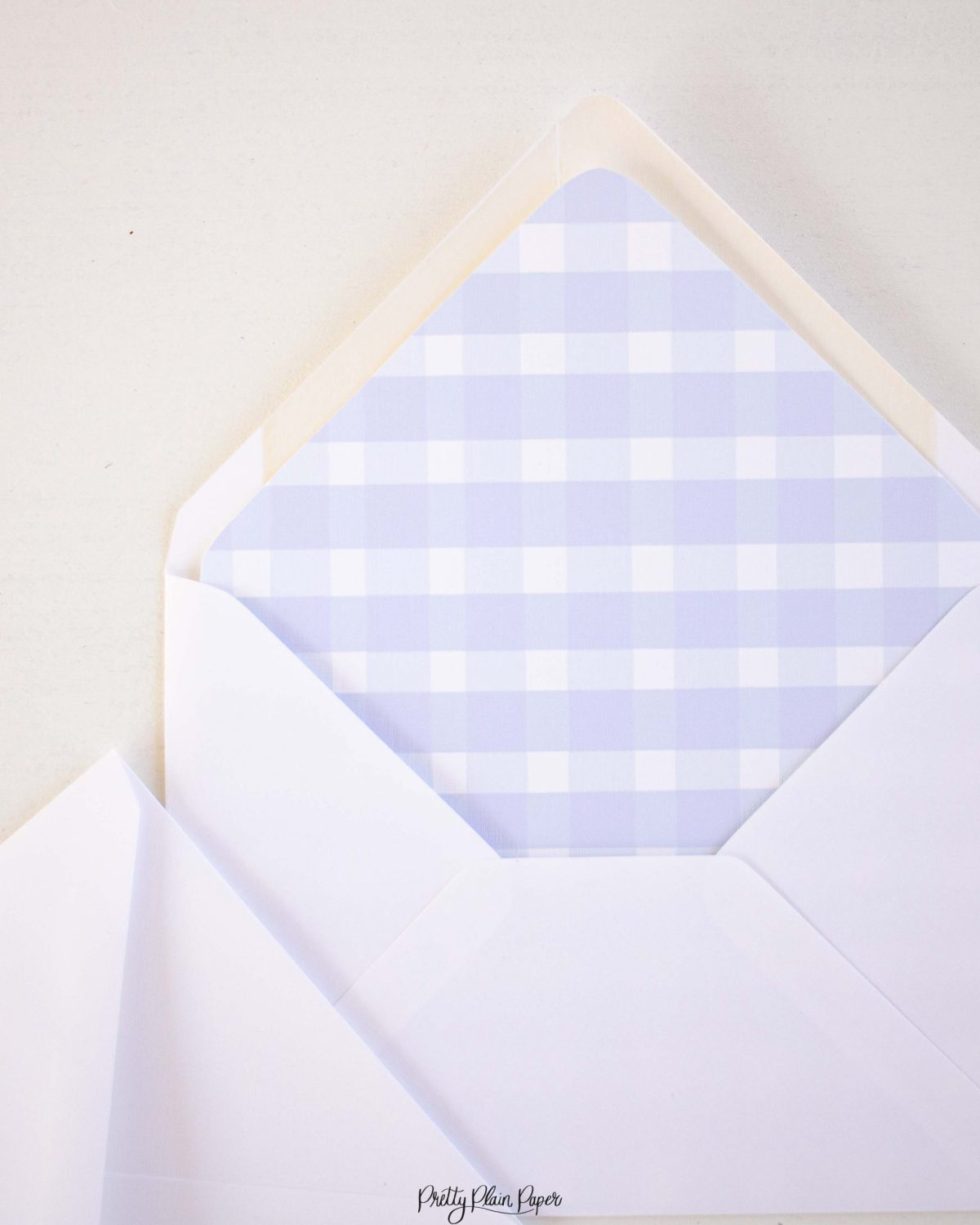 Watercolor Blue Gingham Envelope Liner by Pretty Plain Paper for a Simple, Classic, Traditional First Birthday Party for a Boy